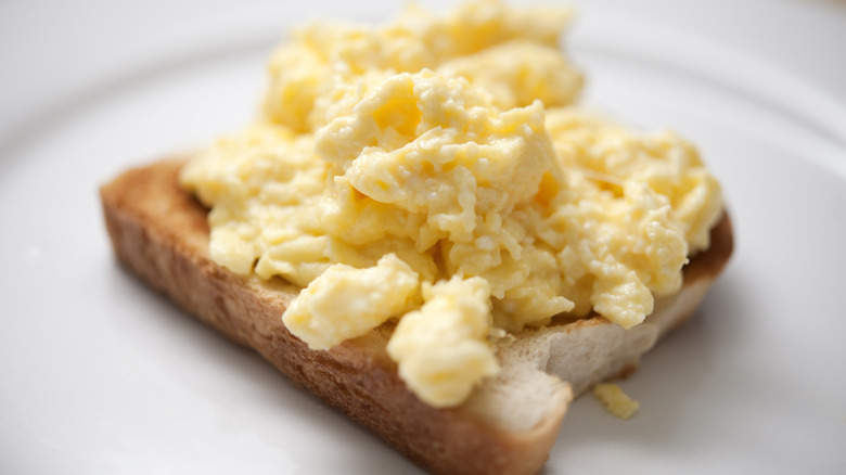 Scrambled egg on toasted bread