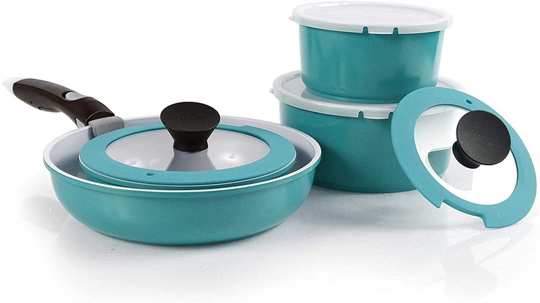 Teal pans set on white background