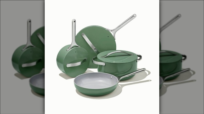 green cookware set on white background