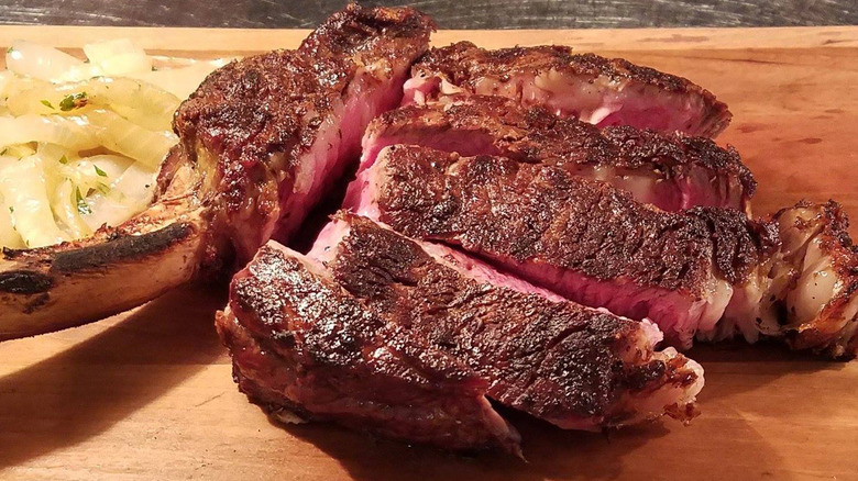 Oak Steakhouse steak on cutting board