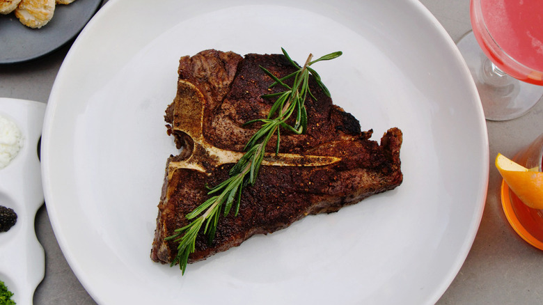 Urban Farmer steak with rosemary on plate