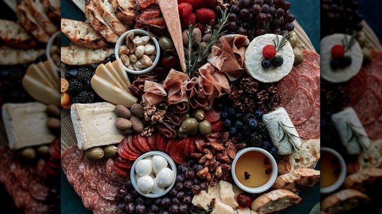 charcuterie board on black background 