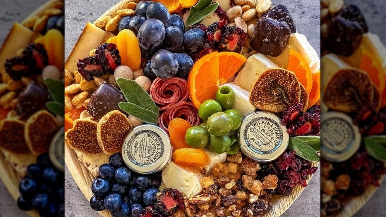 charcuterie board on gray background 