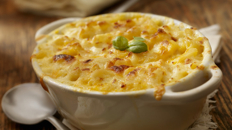 baking dish full of golden macaroni and cheese