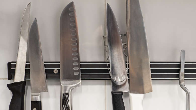 Knives hanging from a rack