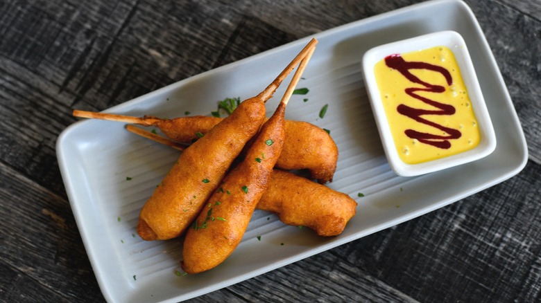 Corn dog shrimp white plate