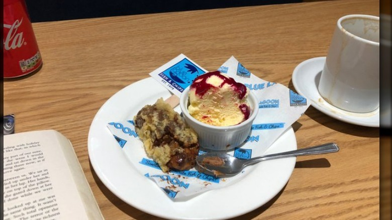 A deep fried Mars Bar with a serving of ice cream