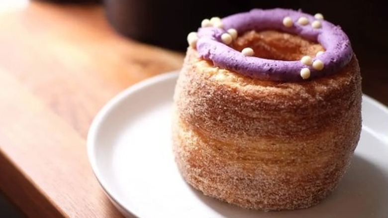 Tall cronut on a plate