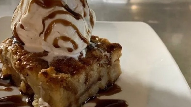 Bread pudding with ice cream and cola sauce