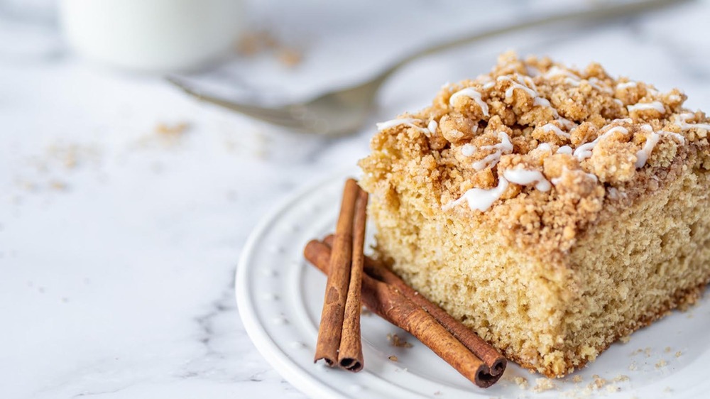 white plate of cinnamon streusel coffee cake