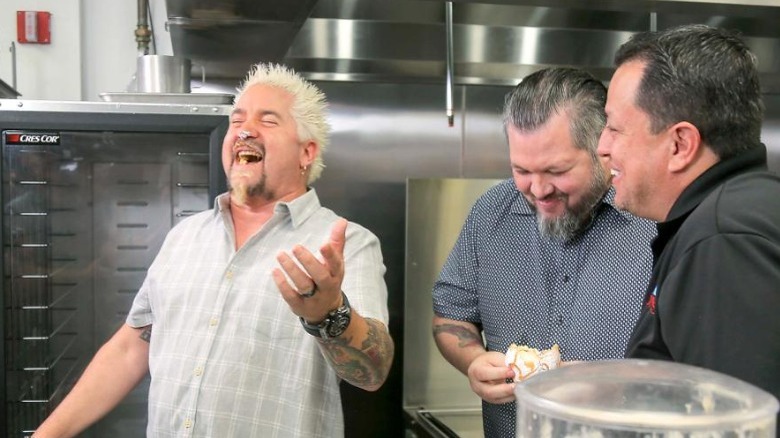 Guy Fieri laughing 