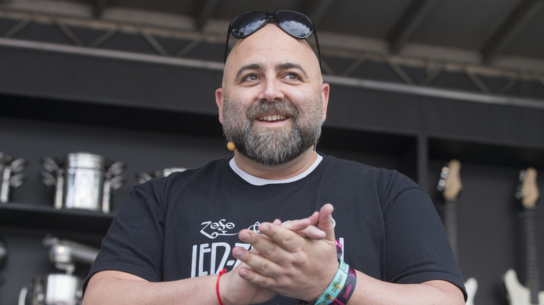 Duff Goldman smiles with sunglasses