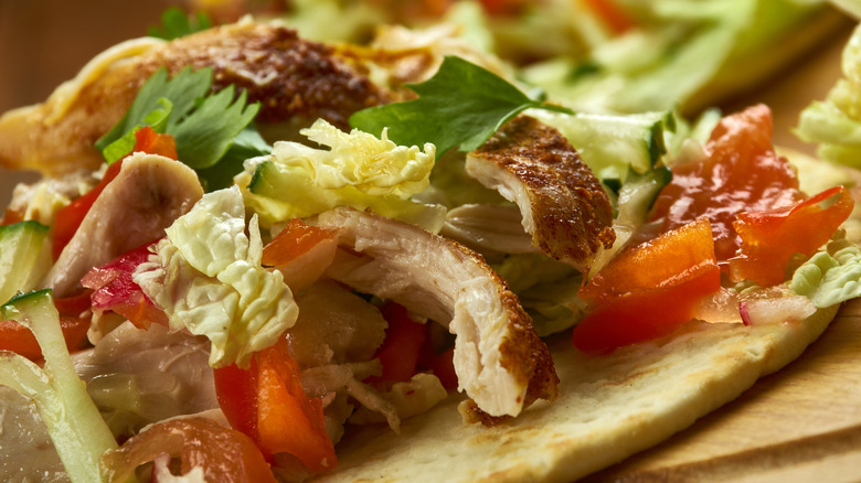 Chicken tostada with toppings