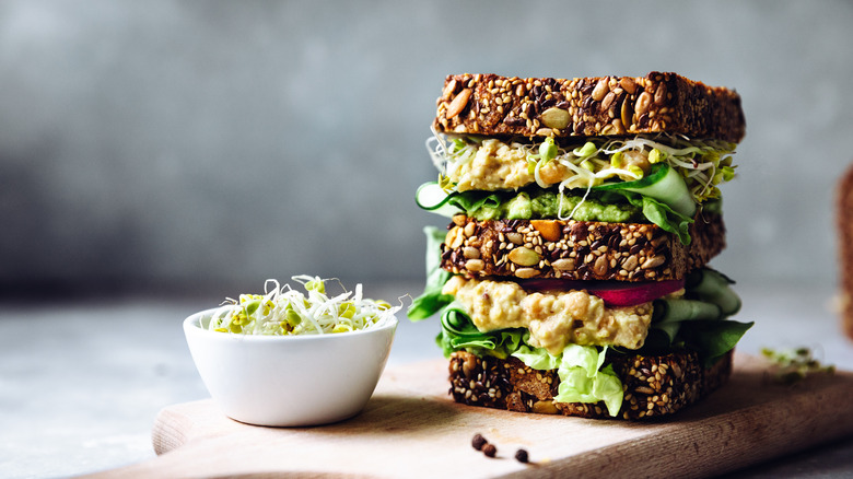 Veggie sandwich with side of beansprouts