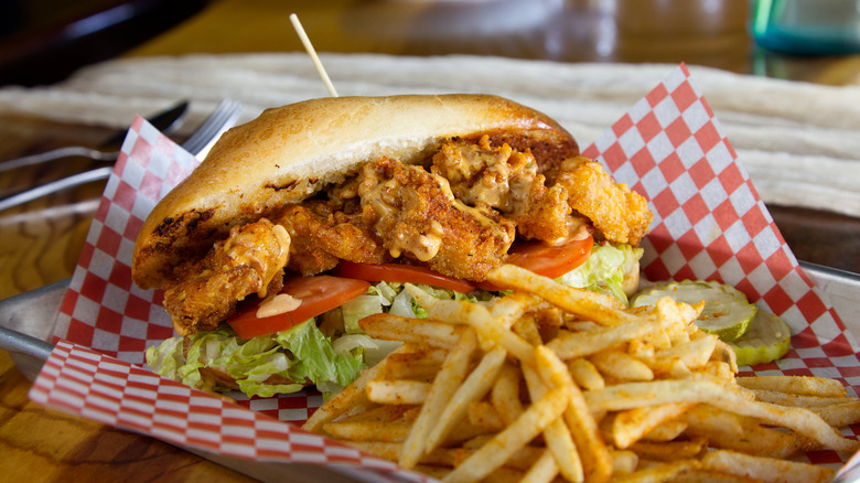 Shrimp sandwich fries and toppings