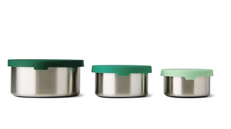 Steel dishes with green lids