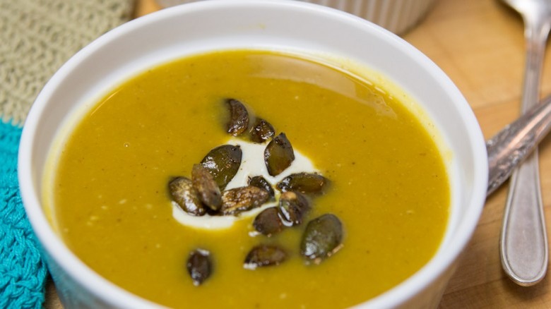 squash soup in white bowl