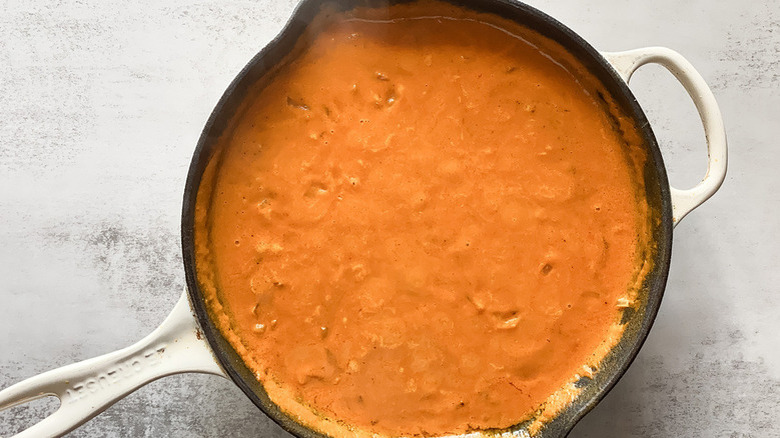 pumpkin sauce in white pan