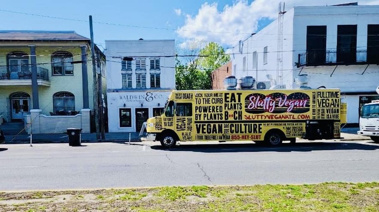 Slutty Vegan yellow food truck 