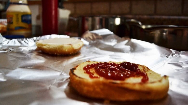 hamburger bun with ketchup