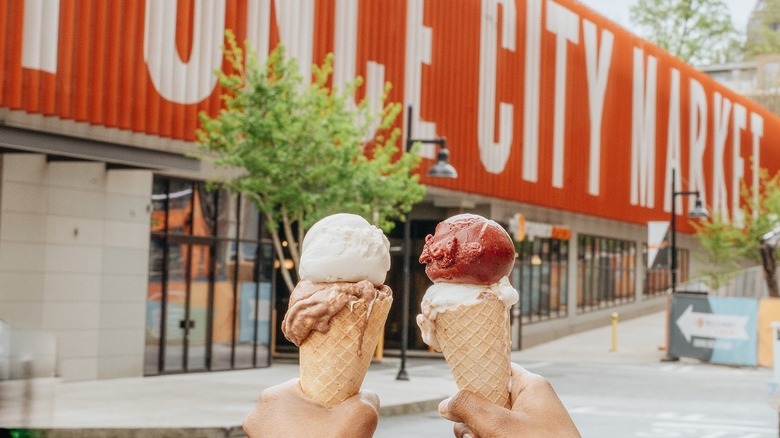 Hands holding ice cream