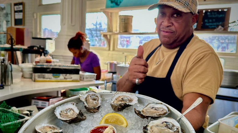 Vendor serving oysters