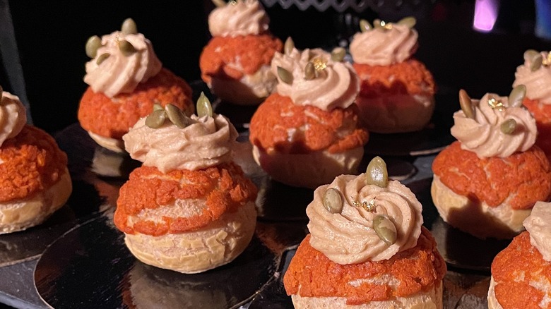 Mini Pumpkin Cream Puffs arranged