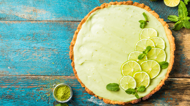 Key Lime Pie on Blue Background 