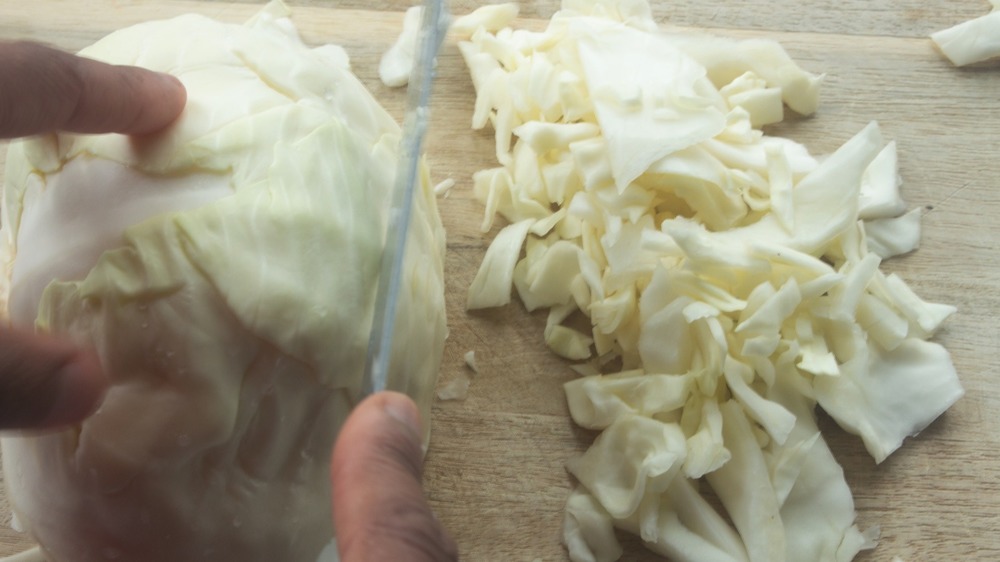 cutting cabbage for fried cabbage