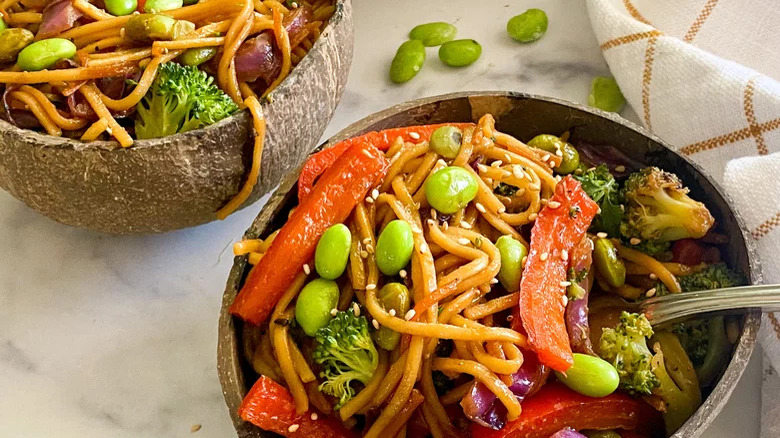 Two bowls of vegetable lo mein