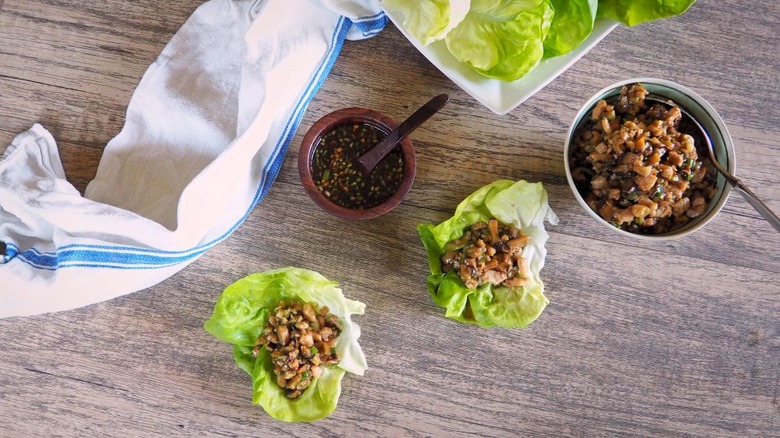 Lettuce wraps on a wooden table