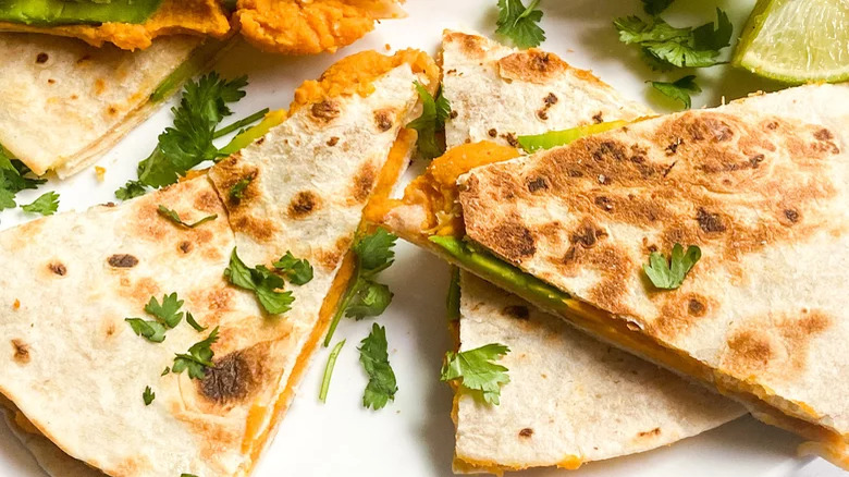 Quesadillas filed with sweet potato and avocados