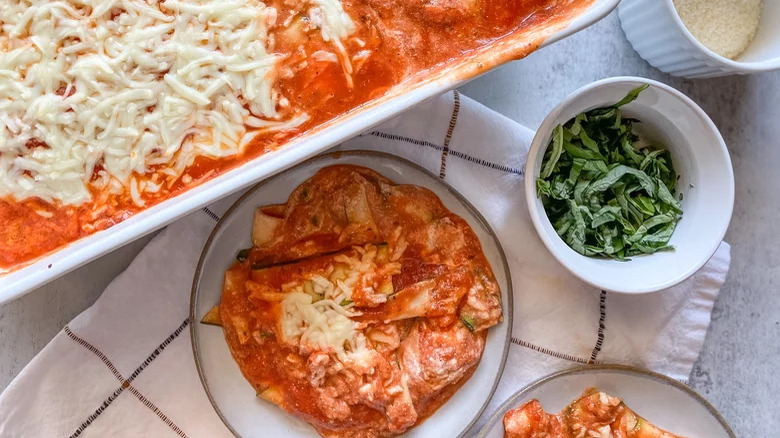 tray and plate of lasagna