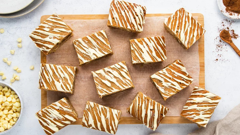 Blondie squares with white chocolate drizzles.