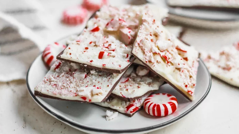 Pieces of white and dark chocolate mint bark candy.