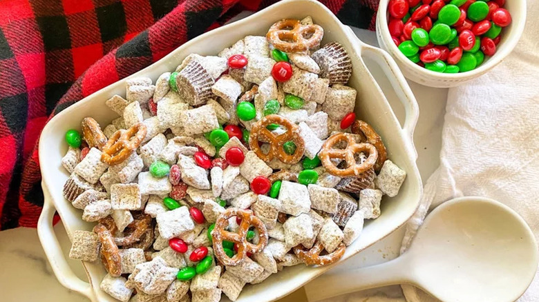 Baking dish with sugar-coated cereal and candy snack mix.