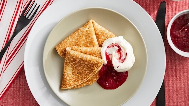 Pancakes on plate with jam