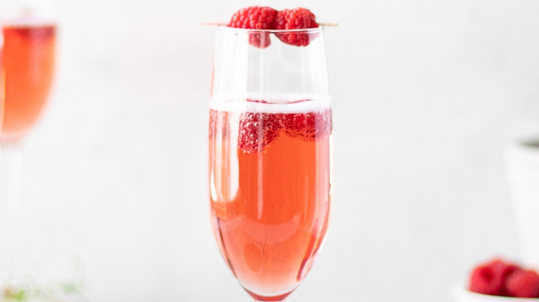 Champagne with raspberries