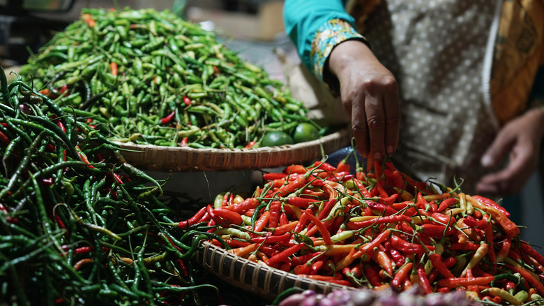 Assorted chilis in baskets