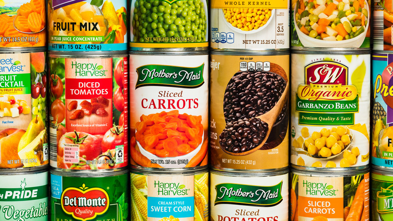 stacked fruit and vegetable cans