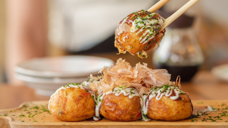 Takoyaki balls with chopsticks