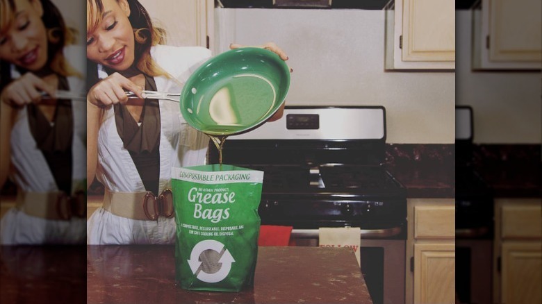 Woman pouring grease into bag