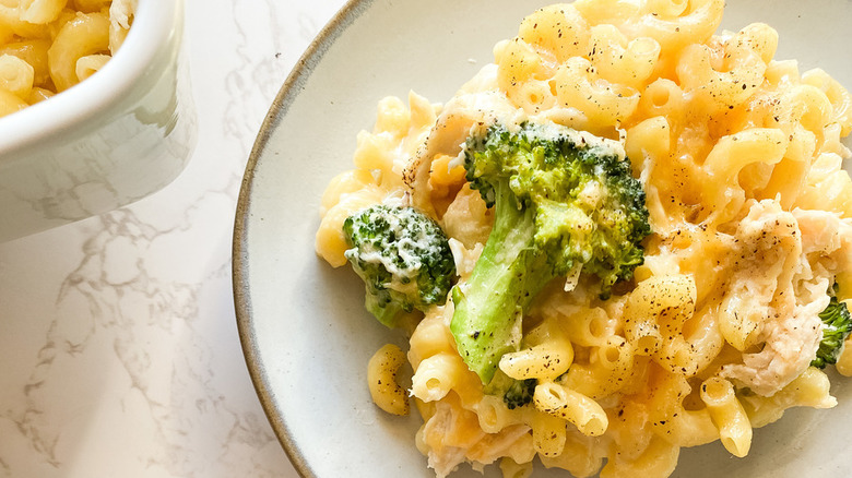 Mac and cheese with shredded chicken and broccoli.