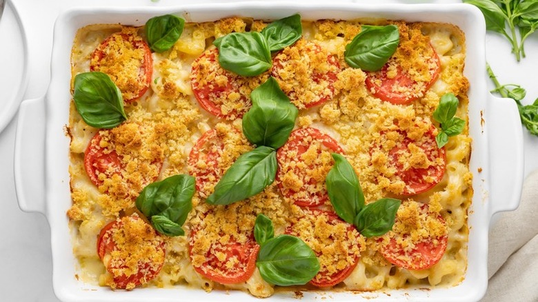 Baked mac and cheese, with tomatoes and basil.