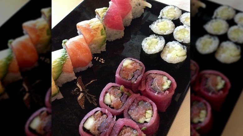 Bushido's sushi rolls on black plate