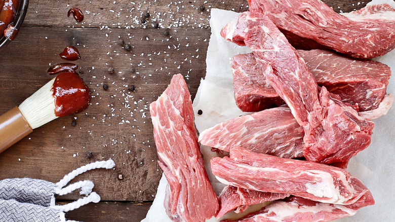 Boneless short ribs in black container