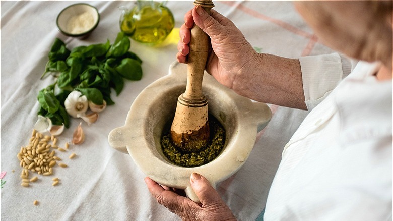 woman making pesto 