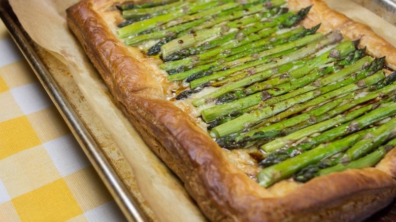 Flaky buttery puff pastry topped with baked gruyere and spring green asparagus