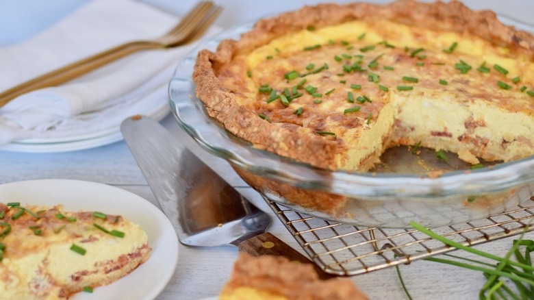 Fresh baked quiche Lorraine in a clear pie dish