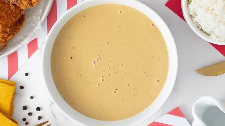 Chicken gravy in white bowl